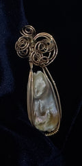 Beautiful Broque Pearl with Bronze Wirewrap