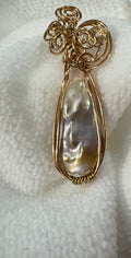 Beautiful Broque Pearl with Bronze Wirewrap